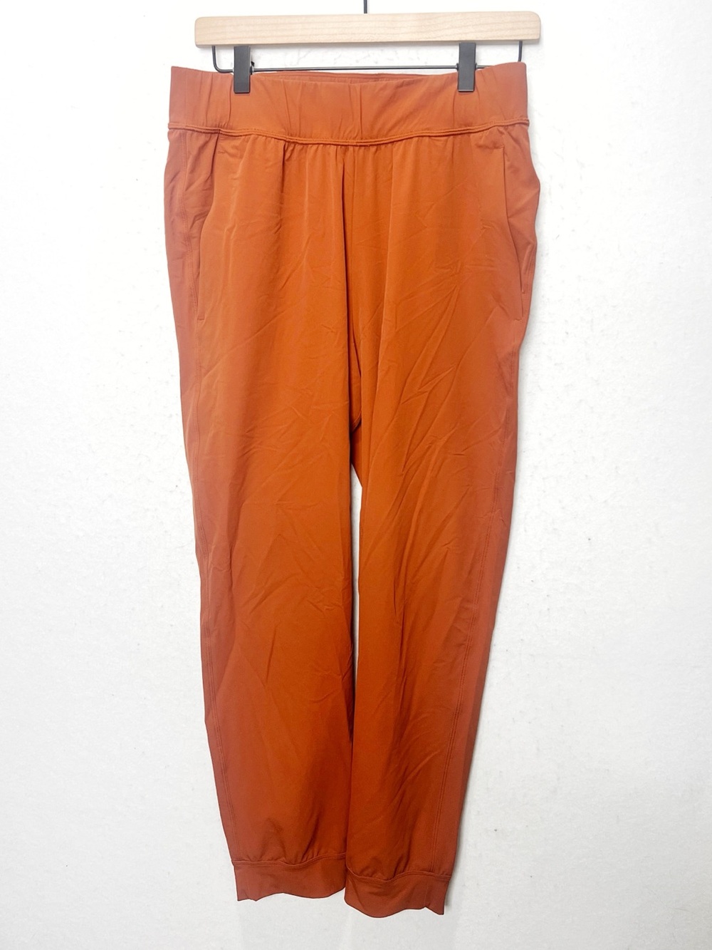 Cotopaxi Women's Veza Adventure Jogger Pants Spice Rust Orange Zip Pocket Medium